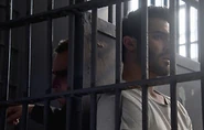Derek et M. Argent en prison