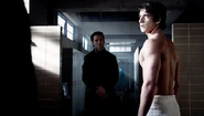 Scott is confronted by Peter Hale, the werewolf that bit him for the first time.