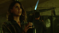 Shelley-Hennig-Malia-holding-torch-Teen-Wolf-Season-6-Episode-9-Memory-Found