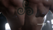 Derek's triple spiral tattoo.