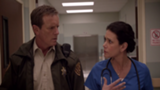 160px-Teen Wolf Season 3 Episode 7 Currents Linden Ashby Melissa Ponzio Sheriff and Melissa McCall investigate.png
