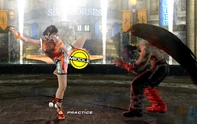 Xiaoyu landing a mid attack in Tekken 6.