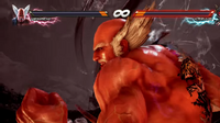 Die, Kazuya! The empowered Heihachi prepares to use his rage art