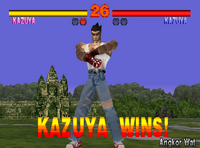 Kazuya's win pose in his Player 2 outfit.