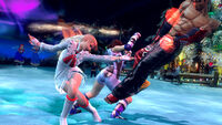 Lili and Asuka team attacking Jin.