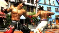 Jin Kazama and Kazuya Mishima about to cross punches.