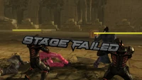 Jin beats the player and the stage failed message can be seen.