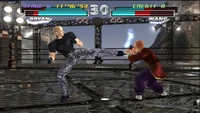 Wang Jinrei blocking Bryan's kick.