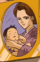 Kazumi Mishima (holding Kazuya as a baby) as seen in Tekken: The Motion Picture.