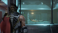 Jin unconscious in a Violet Systems medical facility after Lars rescued him in Tekken 7.