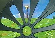 One of the windows of the Tubbytronic Superdome with the Magic Windmill outside