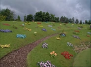 The Teletubbies stand until cue.png (1.7 MB) Tinky Winky's arm shown as the Teletubbies stand off-screen until cue.