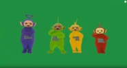 The Teletubbies appear while some piano music plays. The Narrator says 'Teletubbies love each other very much'. Then the Teletubbies all have a Big Hug before walking away.