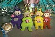 The Teletubbies getting ready to clean themselves