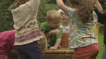 The children sing the nursery rhyme 'Sing a Song of Sixpence'.