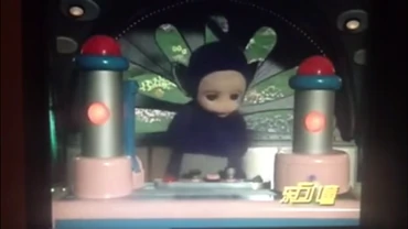 Tinky Winky preparing the Tubby Custard while the Magic Windmill interrupts him