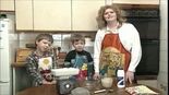 George, Thomas and his mum making bread.