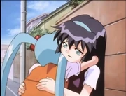 Misao hugs Sasami, to comfort her, after Tenchi’s departure breaks Sasami’s heart.