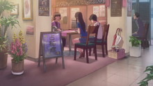 Natsumi and Hodaka see a fortune teller