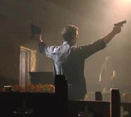 Cromartie with an MP5K in his left hand