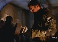 Derek holds the E.F.P.