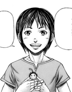Sakurato holding Akari's toy