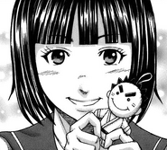 Yuriko making Akari doll