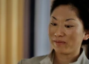 The desk nurse handing Jim the ring