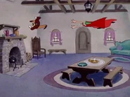 Fairy Godmother chases Wolf around the room