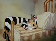 Wolf: "How did you get back here, anyway?" Droopy: "Now let's not get nosey, bub."