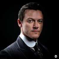 John Moore portrayed by Luke Evans