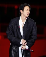 Jin with his hot pink mic (March 2026)