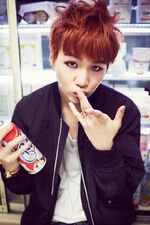 Suga promoting "War of Hormone" #1 (October 2014)