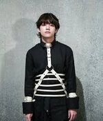 V in the "Fake Love" outfit.