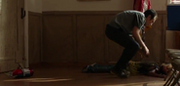 Doug checking on Dink's corpse
