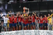Spanish players celebrating their victory