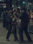 RCMP officers holding Luke