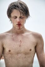 Found this picture on Eugene Simon's Facebook page. It was posted an hour ago. The caption for the picture: "This was a scene about abuse. I did not want contact, I distanced and meditated solely on abuse I've received in the past. On the day we shot that, it was very important that no one was my friend.".