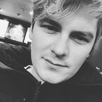 From Brad Kavanagh's Instagram/Webstagram and posted 3 days ago: "This is a face I like to call “Scruffy Brad”. Or “Lés Scrùff”. It’s also a vanity-based reminder to check out our latest single ‘another guy’ in my bio... #grayhairdontcare #pufferjacketswithedge #darkness #forelornhope #costacoffee #monochrome #guystuff #shitstubble".