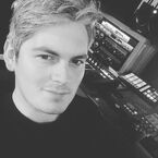 Posted on Brad Kavanagh's Instagram/Webstagram 7 days ago: "It’s just me, my maschine, Yorkshire tea, and some new samples from @thatsounddrums today... putting together some tunes for a touring production this month and the lock in has begun... #kneelingchair #lovelytrees #monochromatic #grayhairdontcare #levi".