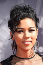 Alexandra Shipp attending the MTV VMA's 2014 red carpet.