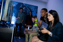 Tweeted by Tasie: “Talex playing Halo 4”. You can also see Klariza Clayton in the back of the picture.