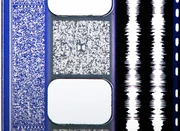 A photo of a 35 mm film print featuring all four audio formats (or quad track)- from left to right:  (SDDS) (blue area to the left of the sprocket holes), Dolby Digital (grey area between the sprocket holes labelled with the Dolby Double-D logo in the middle), analog optical sound (the two white lines to the right of the sprocket holes), and the   (the dashed line to the far right
