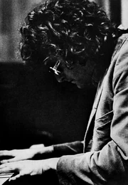 Newman playing piano in 1972