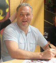 Director Genndy Tartakovsky at the 2015 '"`UNIQ--ref-0000001F-QINU`"'