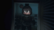 Ignited Freddy in the left entrance with the flashlight off.