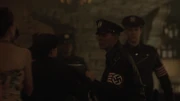 The NYPD Nazi police officers arresting people.