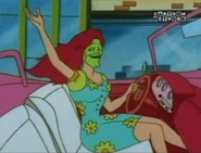 Wave1.jpg (45 KB) Masked Peggy driving her car and waving politely to anyone that she’s driving past through.