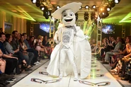 Egg walking down a runway