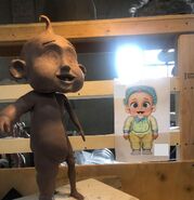 Image of the-making-of Baby, including concept art of the costume